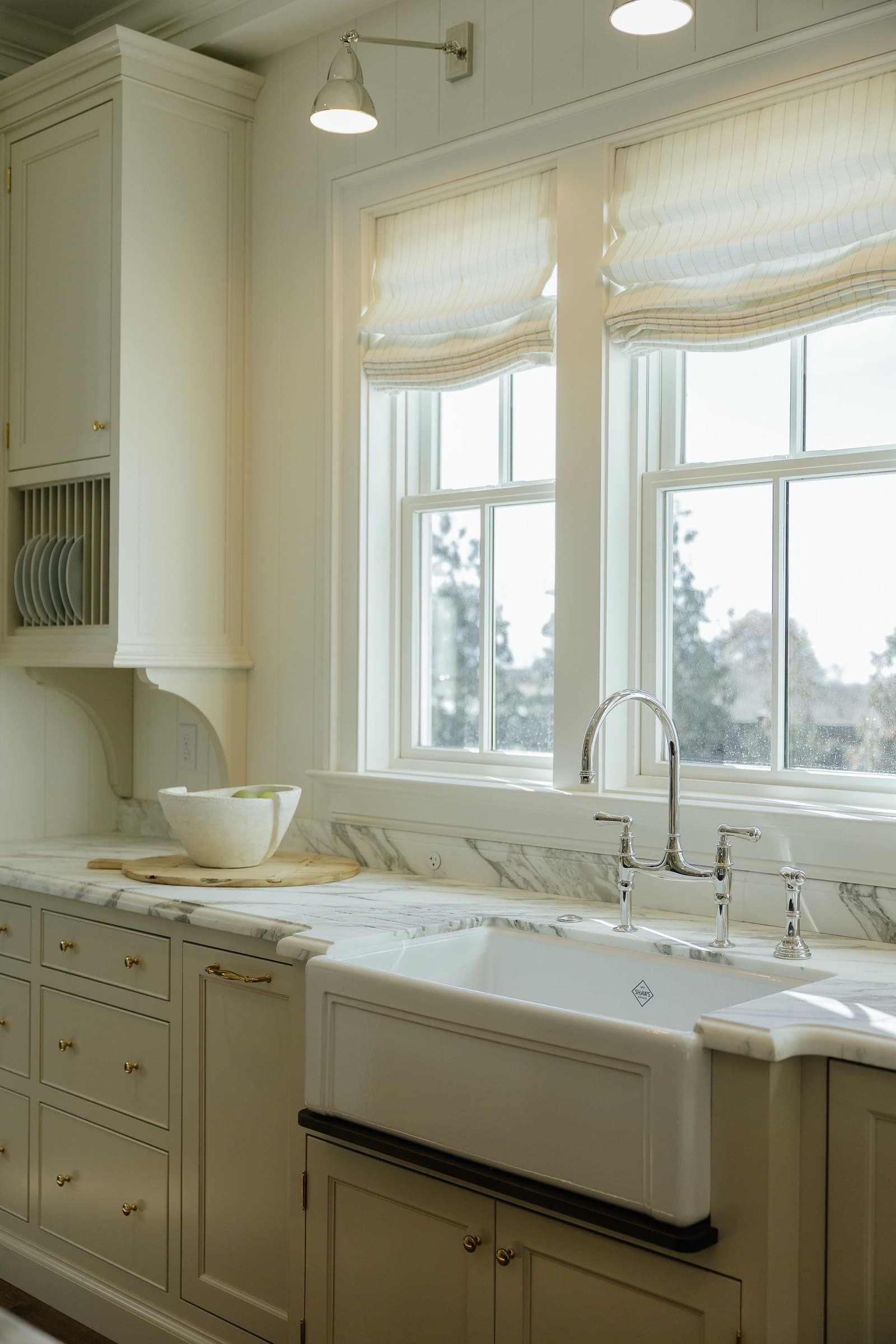 Luxury Utah kitchen with farmhouse sink and marble countertops