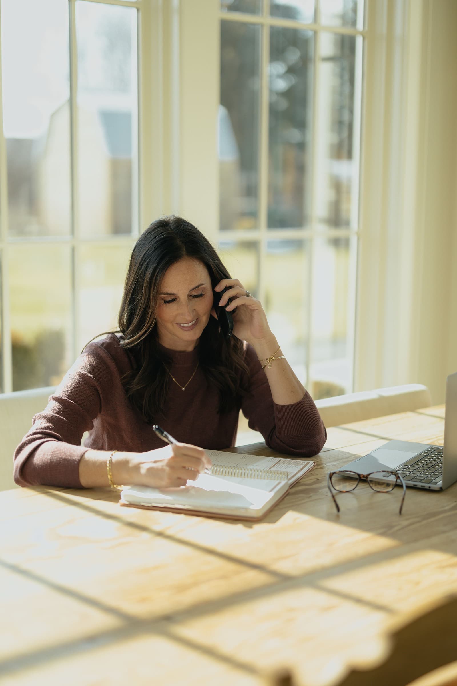 Nicki Christensen working at her desk